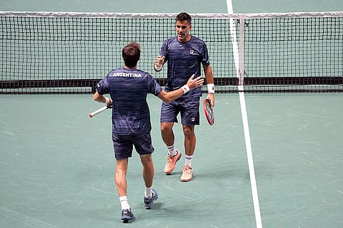 Davis Cup Tennis, Argentina vs Canada: Argentina's Maximo Gonzalez, right, and Andres Molteni celebrate winning their doubles match against Canada's Denis Shapovalov and Vasek Pospisil
